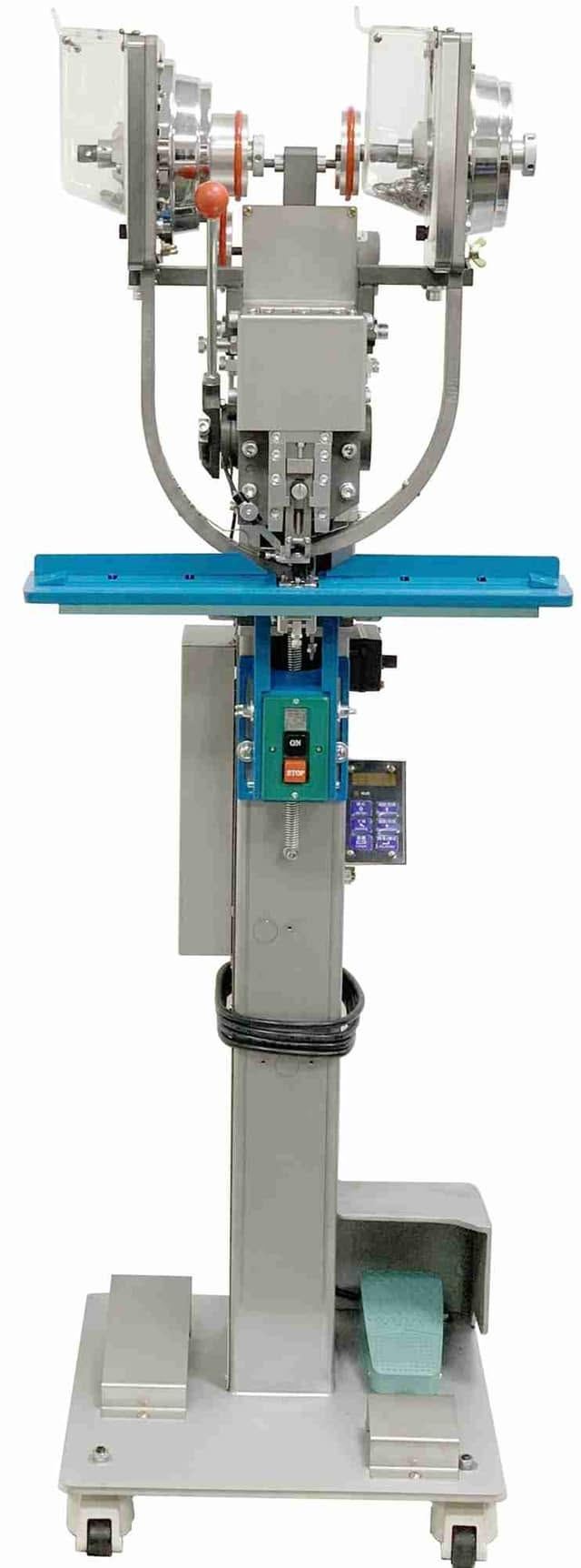 Automatic snap attaching press machine with twin bowl feeders